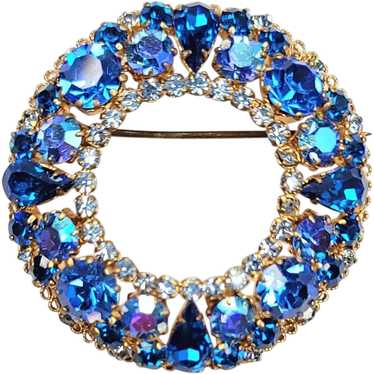 Austria Goldtone Blue Rhinestone Round Brooch Sign