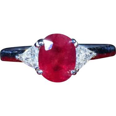 Oval Ruby Engagement Ring set with Trilliant Cut D