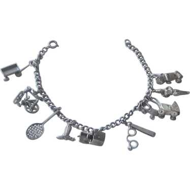 Ten sterling Silver Charms on Sterling Bracelet - image 1