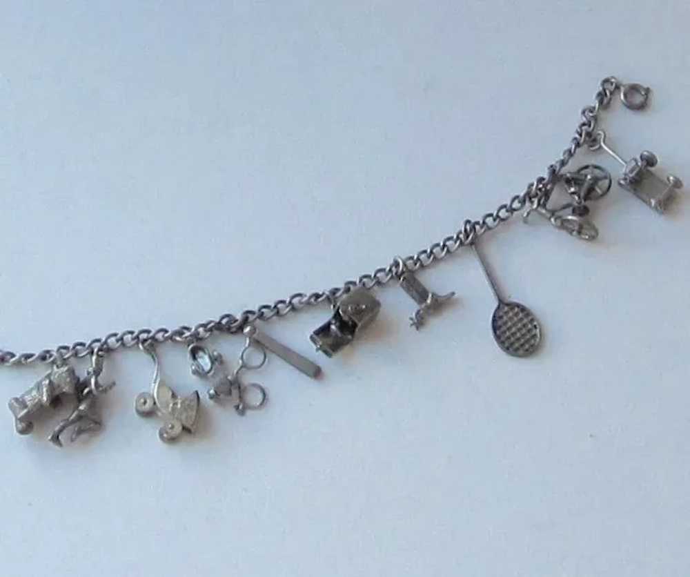 Ten sterling Silver Charms on Sterling Bracelet - image 2