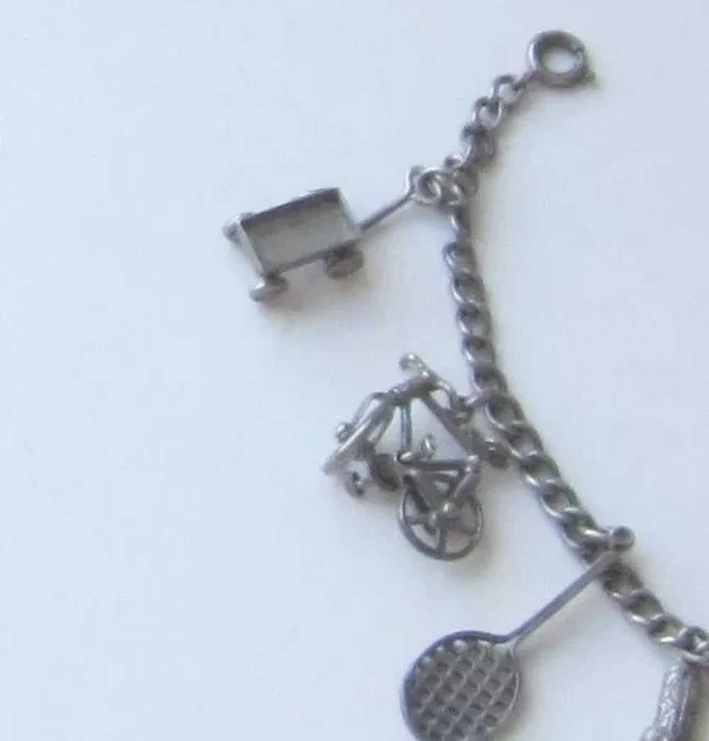 Ten sterling Silver Charms on Sterling Bracelet - image 3