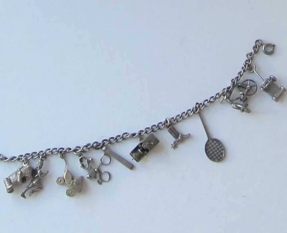 Ten sterling Silver Charms on Sterling Bracelet - image 4