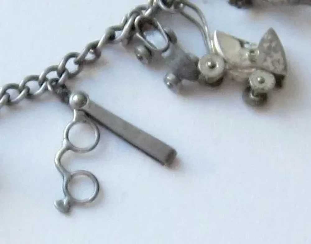 Ten sterling Silver Charms on Sterling Bracelet - image 6