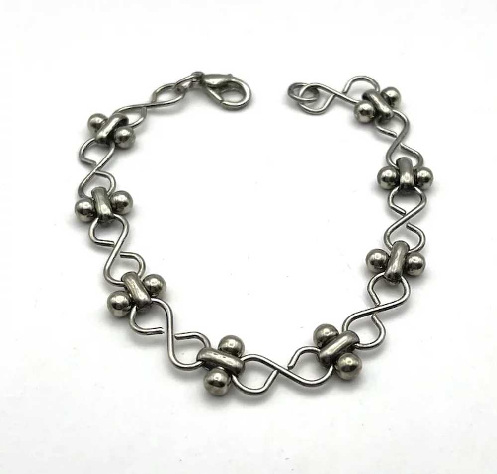 Open Linked Silvertone Bracelet - image 7