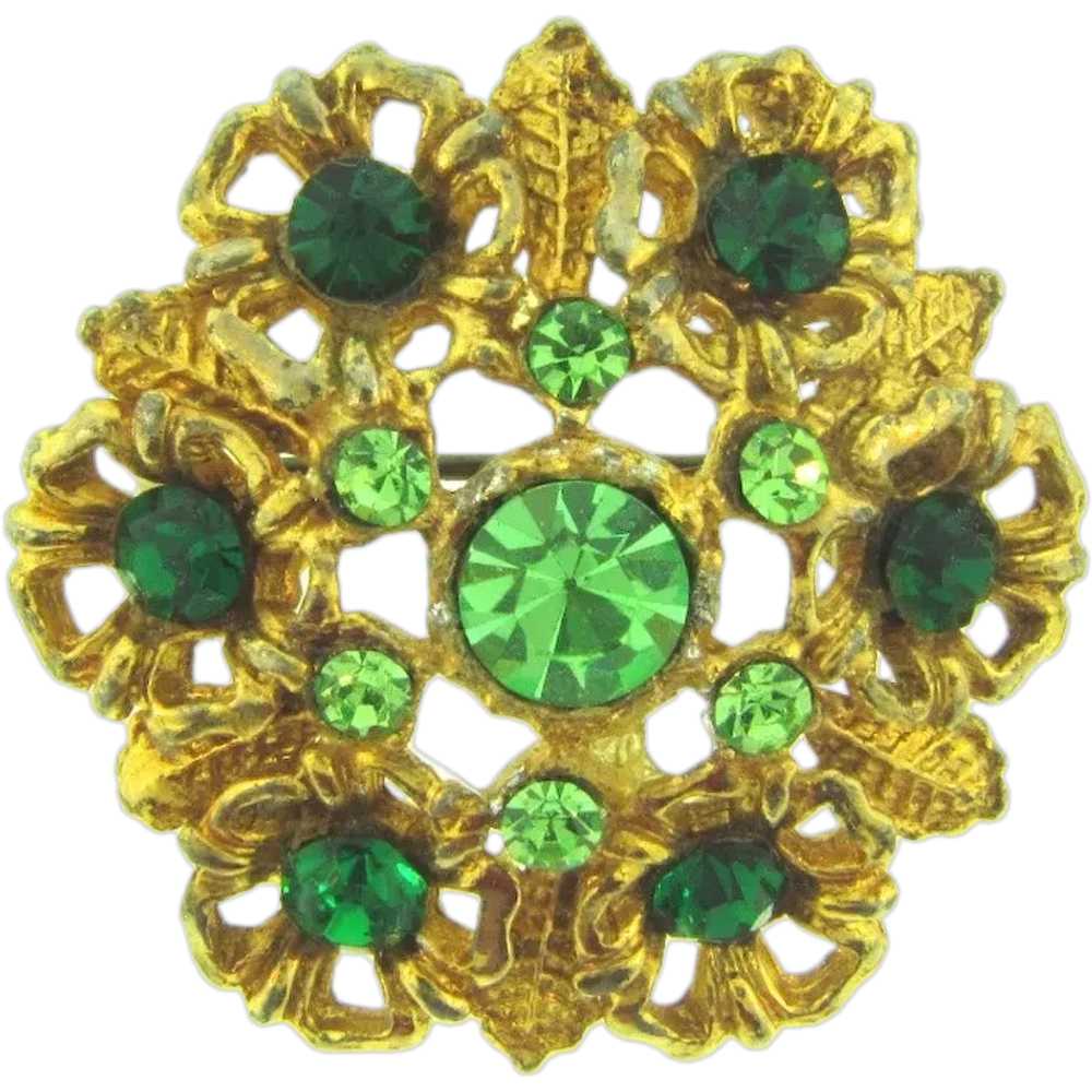 Vintage gold tone circular floral Brooch with gre… - image 1