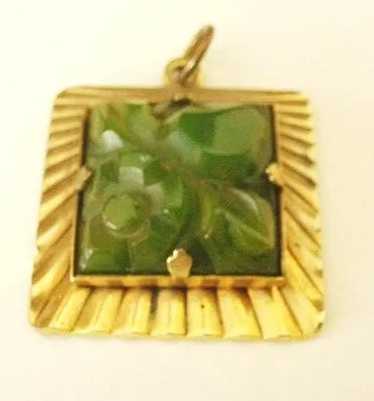 Carved and Pierced Green Bakelite Pendant