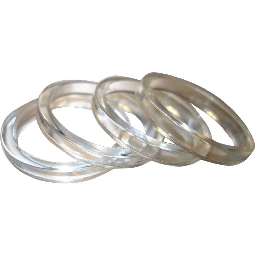 Four Clear Sliced Lucite Bangle Bracelets - image 2