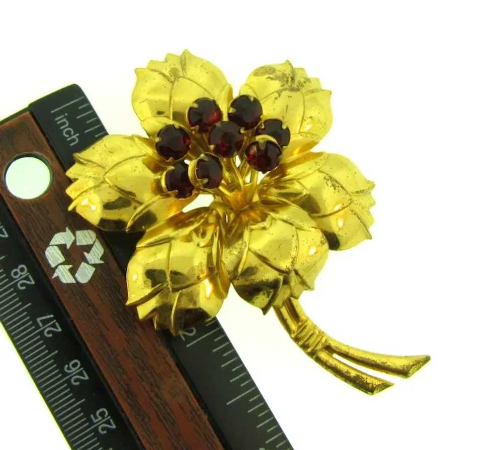 Vintage large gold tone flower Brooch with red rh… - image 3