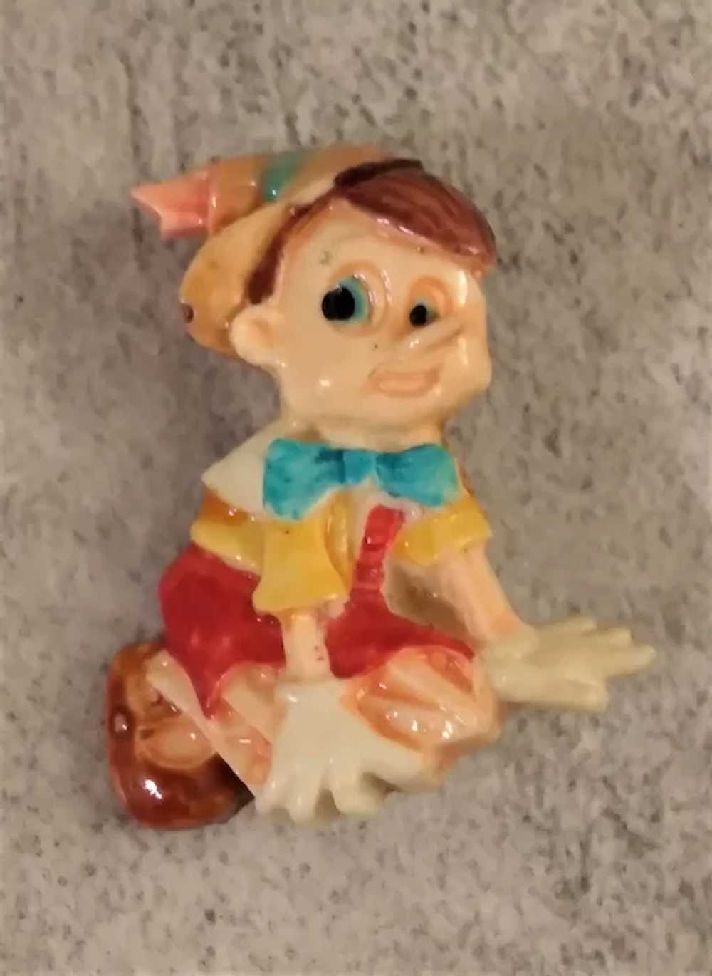 Pinocchio Celluloid Early Plastic Pin Seated Litt… - image 3