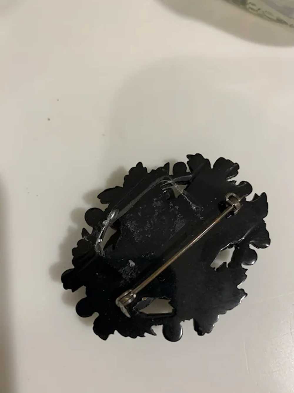 Carved Black Bakelite Floral Pin - image 2