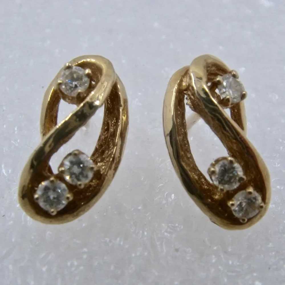 Figure 8 sales earrings 14k