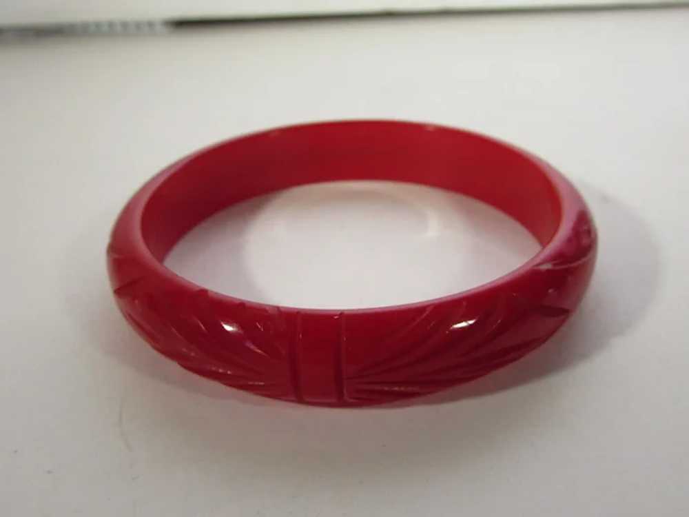 Bakelite Heavily Carved Cherry Red Bangle - image 10