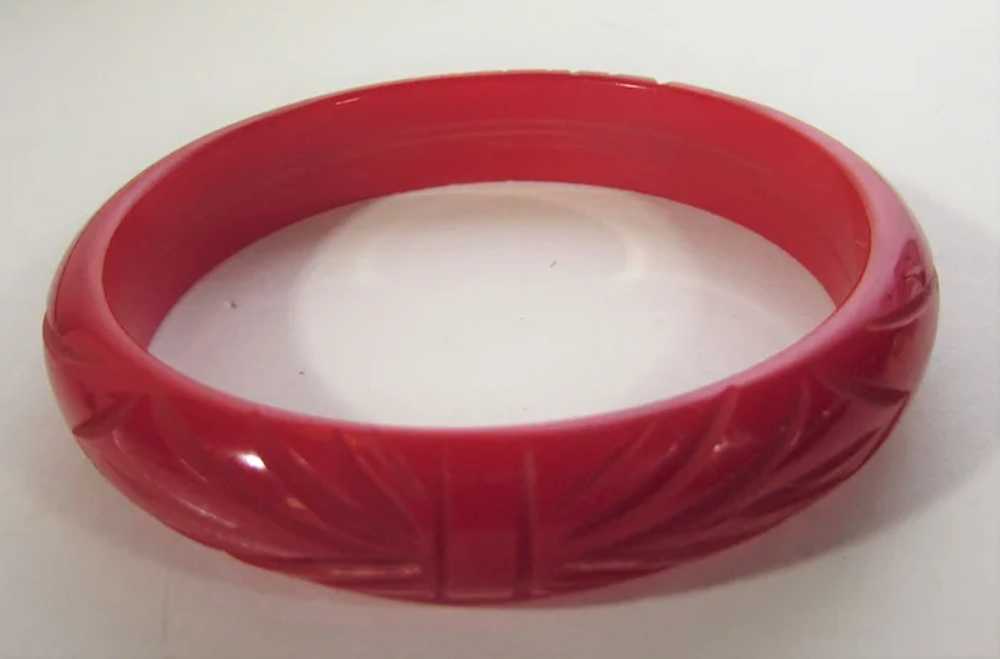 Bakelite Heavily Carved Cherry Red Bangle - image 12