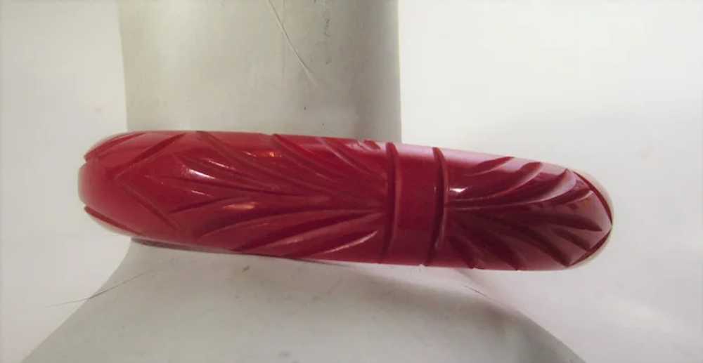 Bakelite Heavily Carved Cherry Red Bangle - image 2