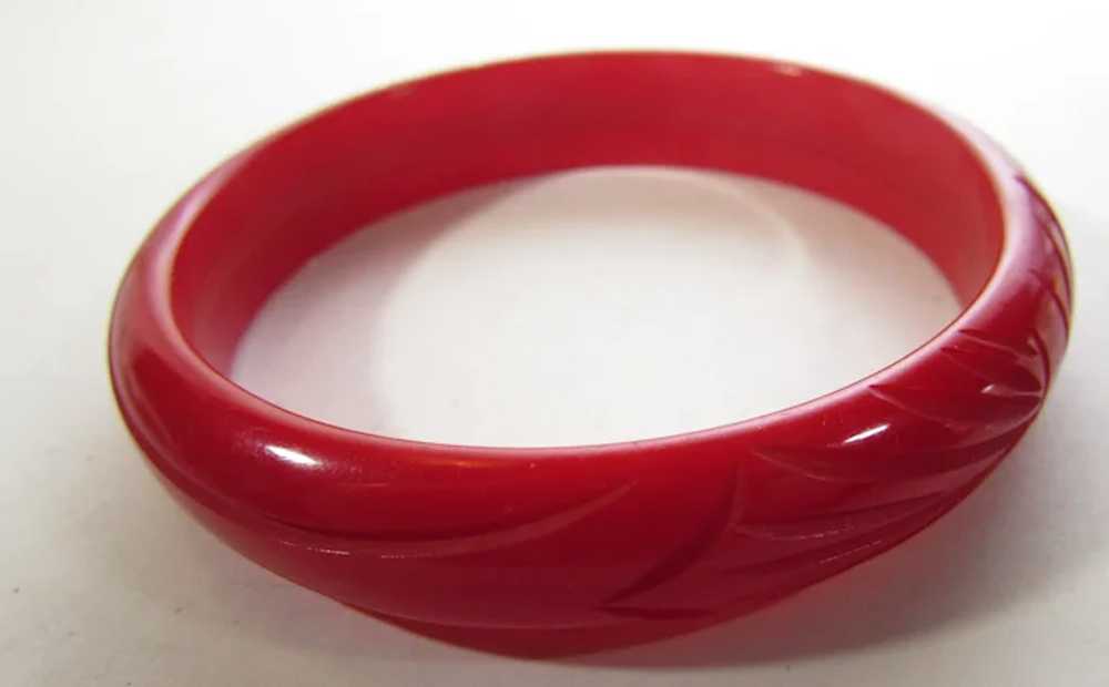 Bakelite Heavily Carved Cherry Red Bangle - image 4