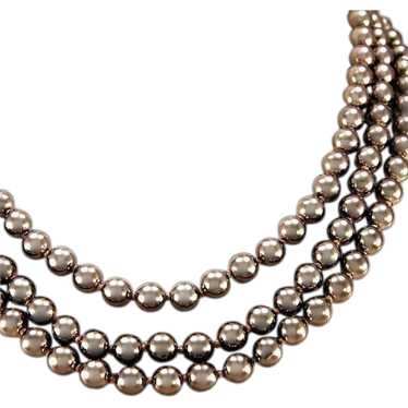 Kenneth Jay Lane Gold-tone and Knotted Faux Pearl… - image 1