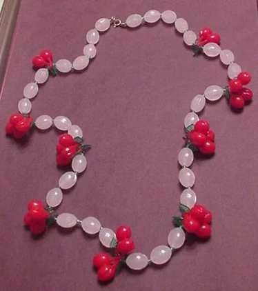 Faux Carved Moonstone with Plastic Cherries / Cher