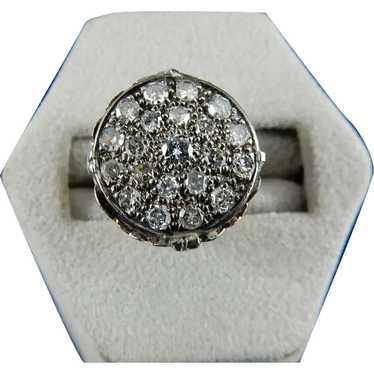 Sold at Auction: A LOUIS VUITTON LES ARDENTES 18CT WHITE GOLD DIAMOND RING;  star and blossom monogram motif centring a round brilliant cut diamond of