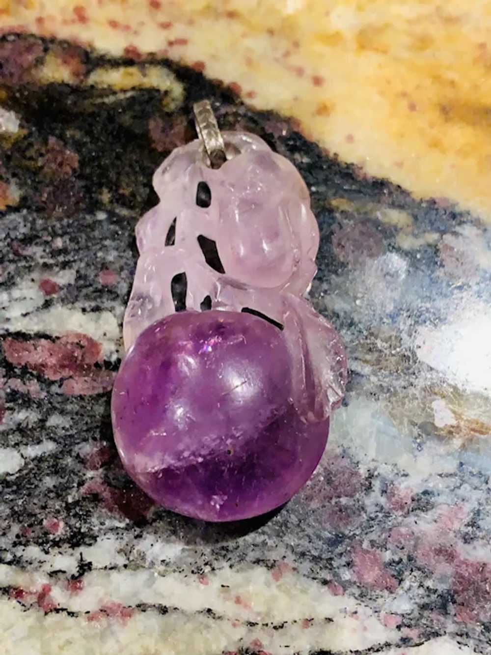 A vintage carved amethyst fruit pendant - image 4