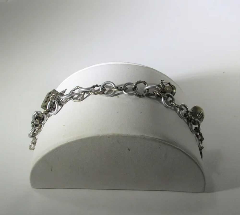 Vintage Silver Tone Charm Bracelet With Four Char… - image 2