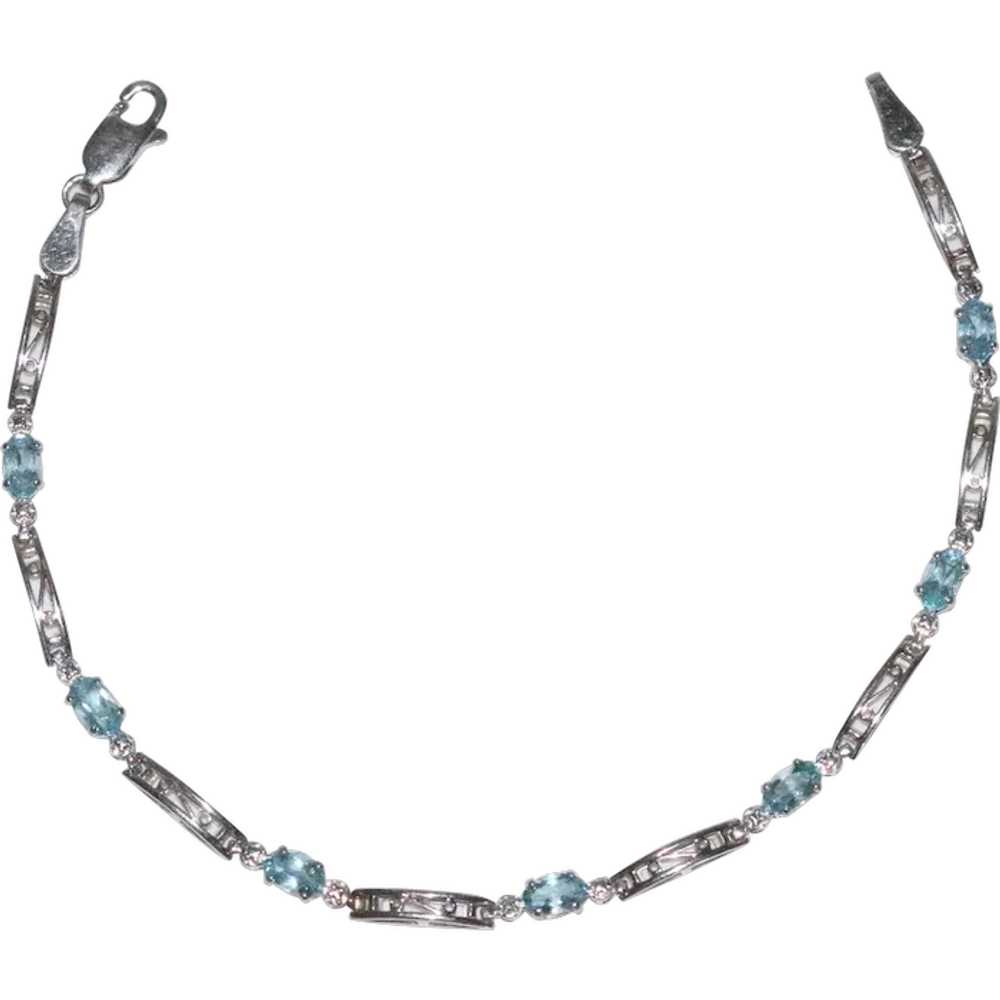 10K White Gold Blue Topaz Bracelet - image 1