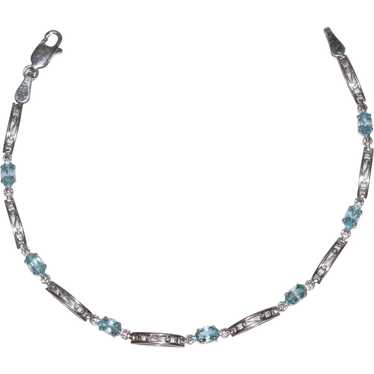 10K White Gold Blue Topaz Bracelet - image 1