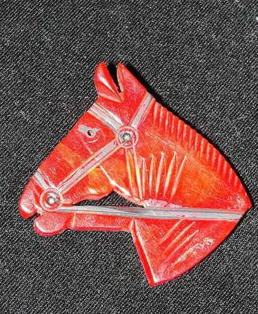 Vintage Red Bakelite Hand Carved Horse Head Brooch