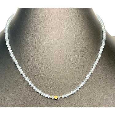 Faceted Blue Topaz and 18k gold Necklace