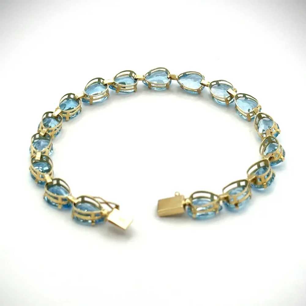 14kt Ladies blue topaz bracelet - image 8