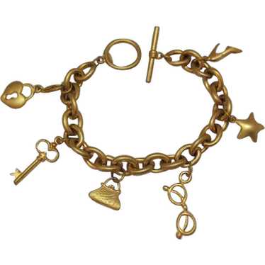 Vintage Signed VS Brushed Gold Metal Charm Bracel… - image 1