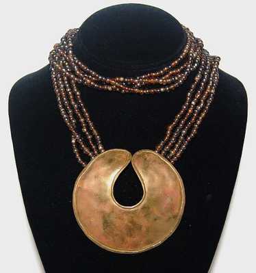 1970s Brass Medallion & Amber Glass Bead Necklace