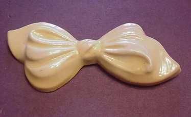 Vintage Pale Yellow Celluloid Bow Pin - image 1