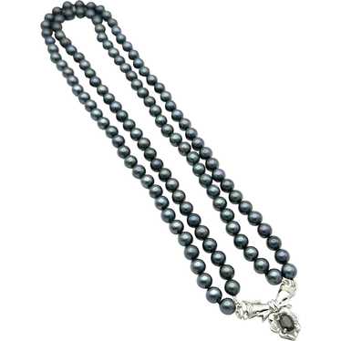 Ladies Vintage 14kt black pearl and sapphire neckl