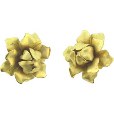 Signed Marvella large gold tone flower clip-on Ear