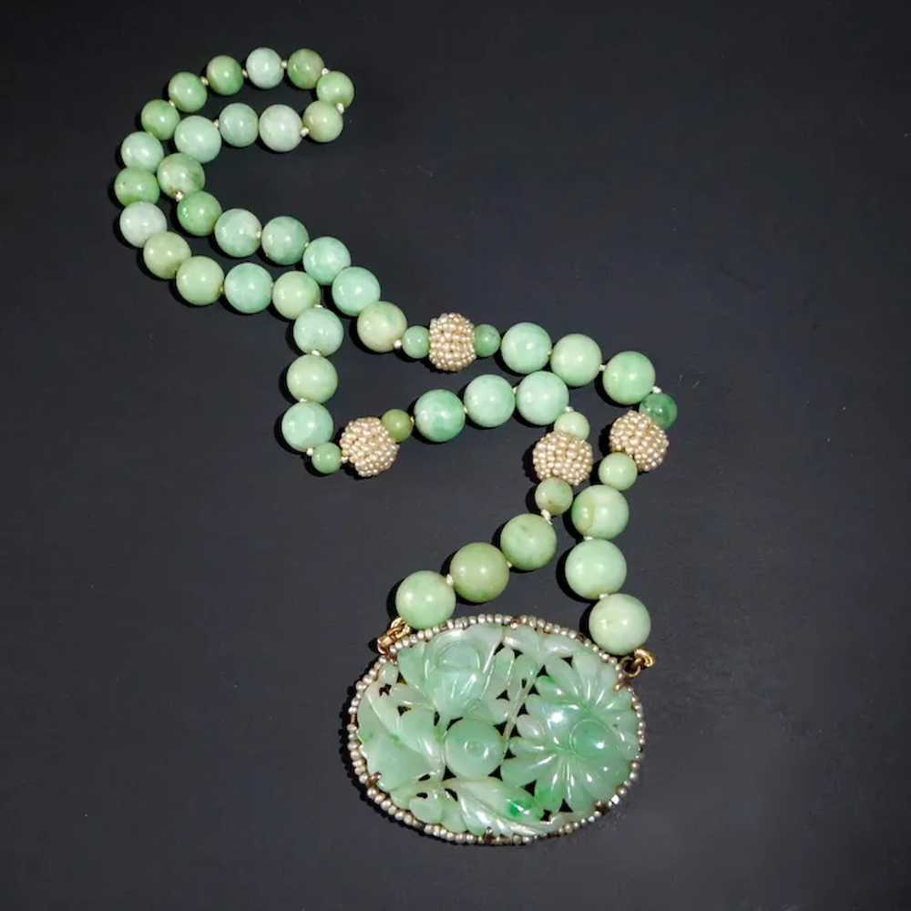 Carved jade bead on sale necklace