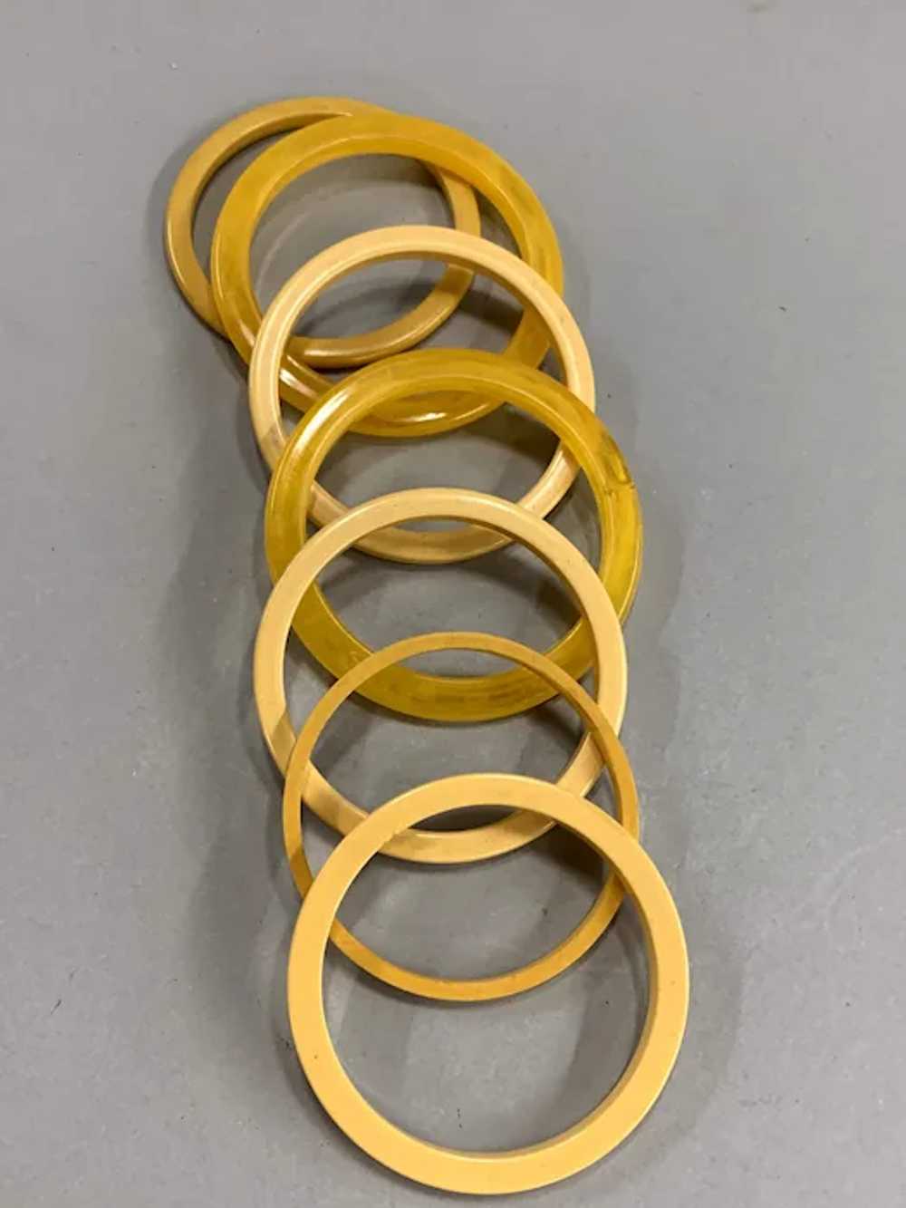 Lot of 7 Bakelite Butterscotch Bangles - image 3