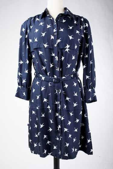 A Blouse dress in navy silk printed with swallows 