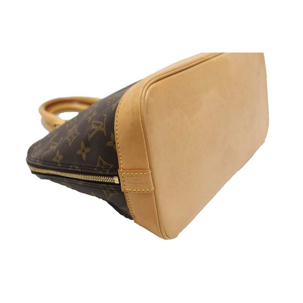 Louis Vuitton Alma cloth handbag - image 8