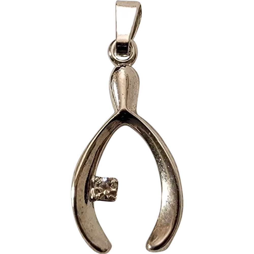 Small silver tone wishbone pendant with rhinestone - image 1