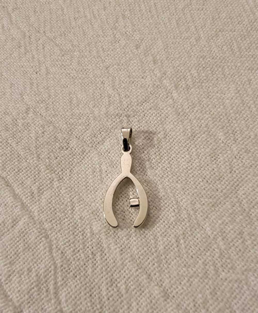 Small silver tone wishbone pendant with rhinestone - image 8