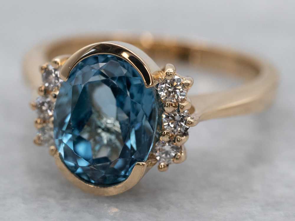 Sleek Gold Blue Topaz and Diamond Ring - image 1