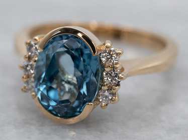 Sleek Gold Blue Topaz and Diamond Ring - image 1