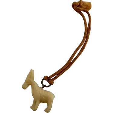 https://img.gem.app/528852770/1t/1669989940/vintage-donkey-animal-celluloid-charm-fob-cracker.jpg