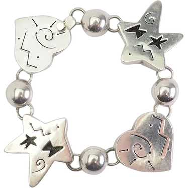 Fun chunky sterling silver hearts and stars design
