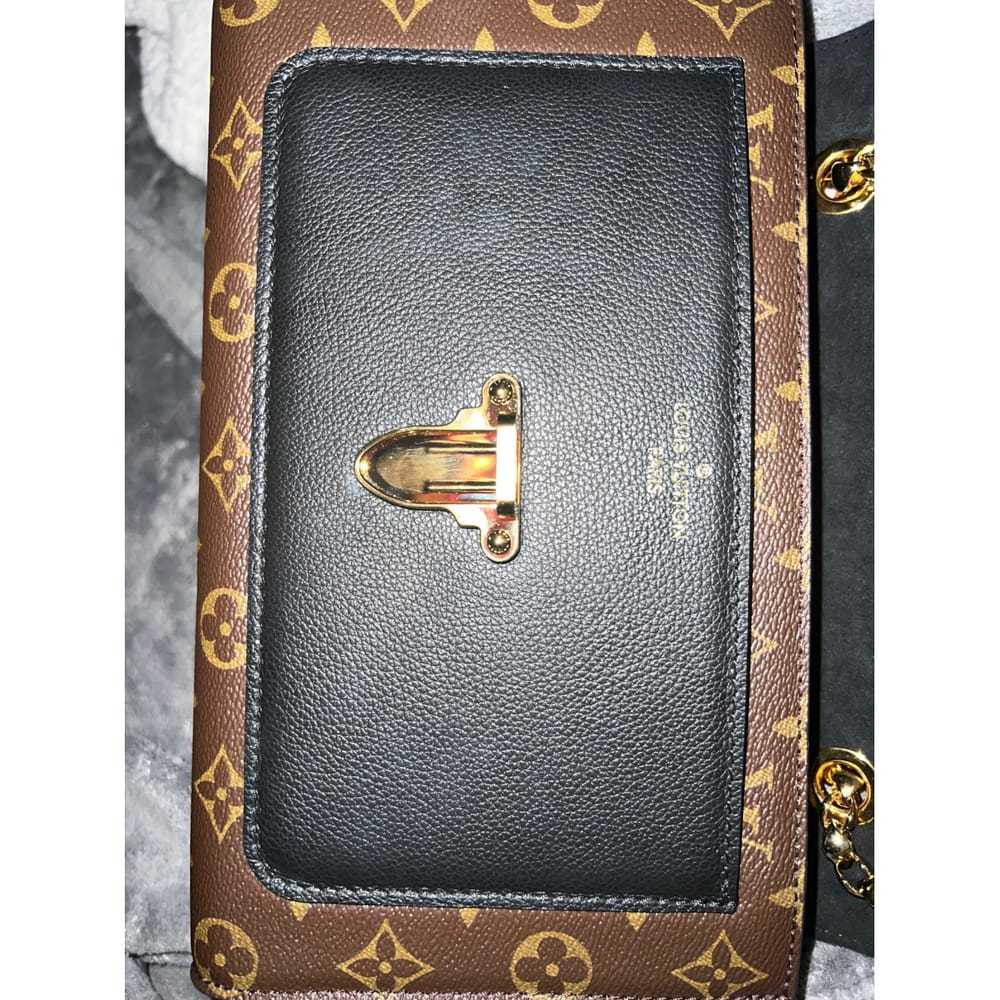 Louis Vuitton Victoire leather handbag - image 7