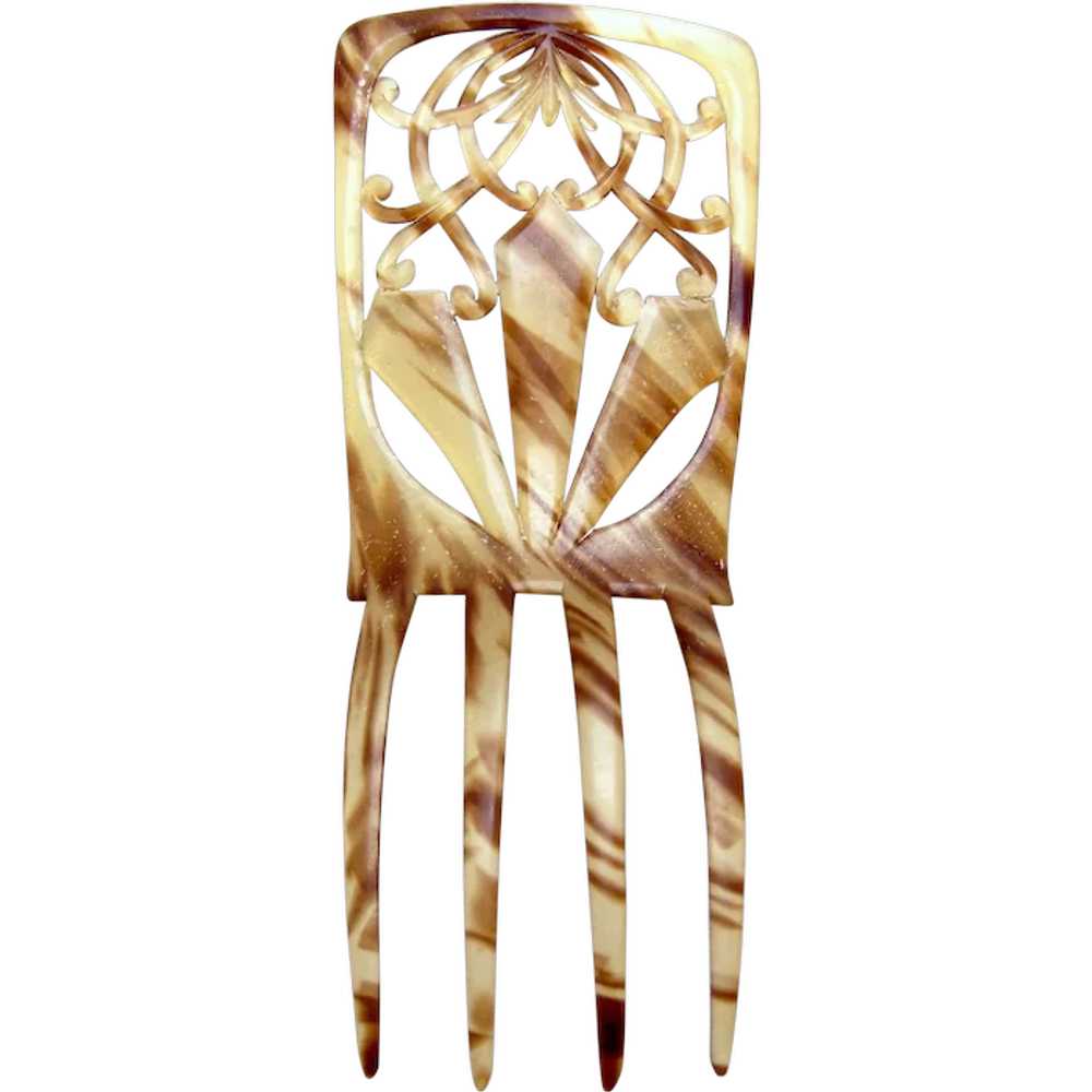 A Spanish style faux shell hair comb from the lat… - image 1