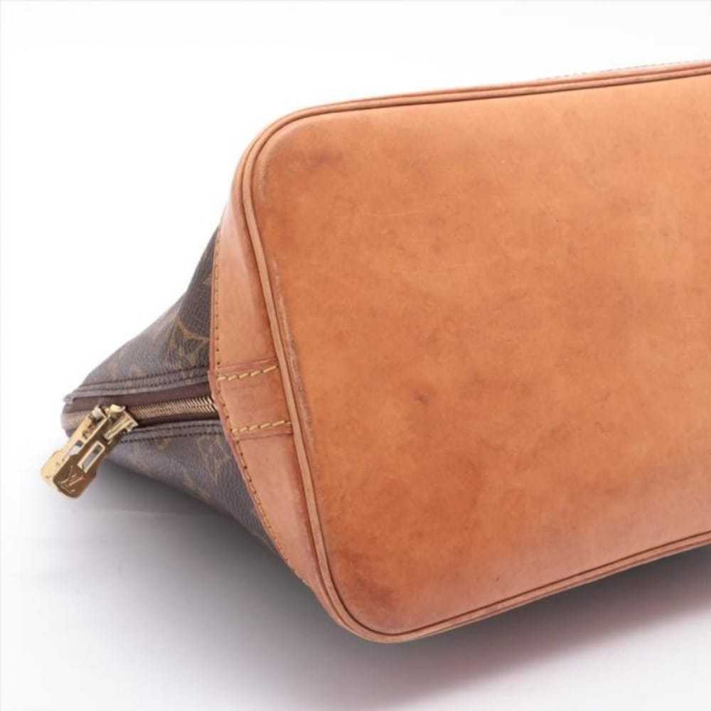 Louis Vuitton Alma cloth handbag - image 11