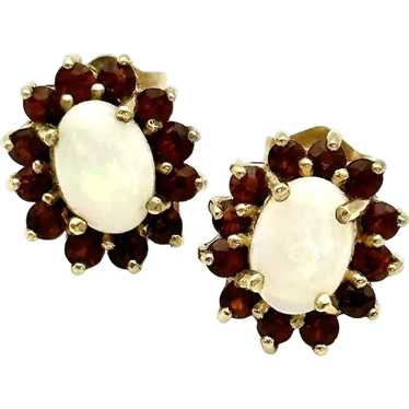 Ladies vintage1 4kt opal and garnet earrings.