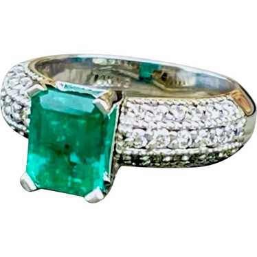 14k Emerald cut Emerald and diamonds ring