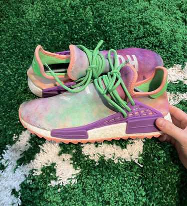 Pharrell human sale race holi